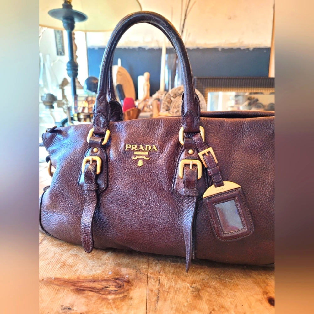 Prada Brown Leather Handbag with Gold Accents